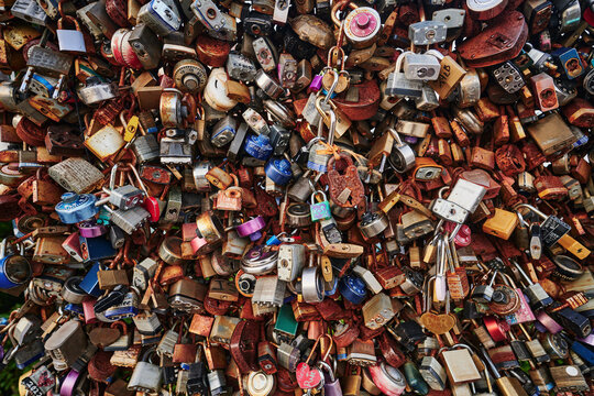 large collection of colorful padlocks, commonly known as love locks, attached to a fence, Portland, Maine, New England 