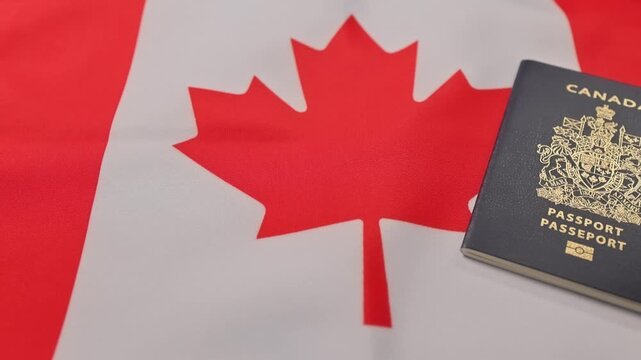 Canadian Passport With National Flag Symbolizing Citizenship And Identity