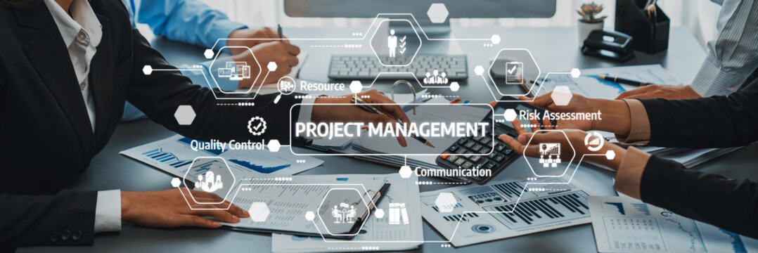 A professional team engages in a project management meeting, discussing strategies, risks, and quality control while utilizing technology to enhance collaboration and effectiveness. Amity