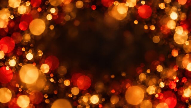 Warm red and gold Christmas bokeh with a soft orb frame and a dark center. Christmas background with copy space. Defocused light for holiday card and banner design.