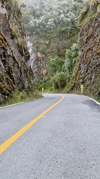 Scenic Mountain Road through High Altitude Landscape. Driving POV. Vertical Video.