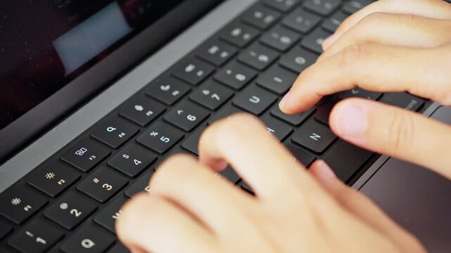 Typing on Computer Keyboard in Close Up View