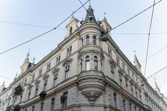 Ornate historic building facade with overhead wires