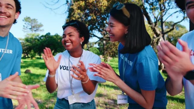 People, hand stack and park for volunteering, teamwork and event success for community outreach. Smile, friends and applause in nature for ngo donation, poverty alleviation and charity collaboration