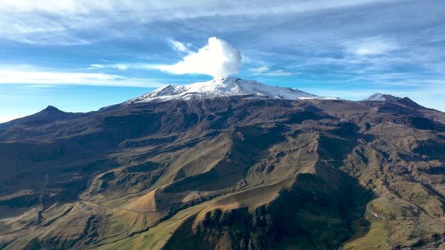 Nevado del Ruiz Snow Covered Volcano in the Colombian Andes. Establishing Shot. Aerial View.