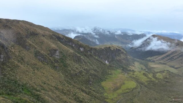 Nevado del Ruiz Snow Covered Volcanic Slopes in the Colombian Andes. Establishing Shot. Aerial View.