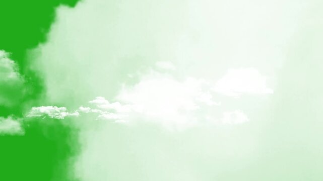 cloud motion toward camera. fluffy white clouds rushing forward through the sky with realistic depth and atmospheric effect. green screen overlay video.