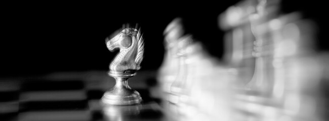 Pieces on chess board for playing game and strategy © Lane Erickson