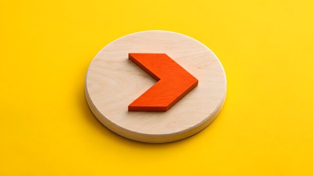 Prominent red wooden arrow sign standing out on a round wooden block against a yellow background representing unique business focus and call to action