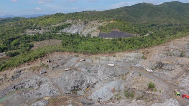 Dump Trucks on a Quarry Haul Road Near Puerto Princesa