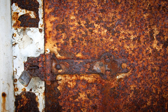 old rusty metal door hinge in an abstract sort of way in the bunkers of Washington