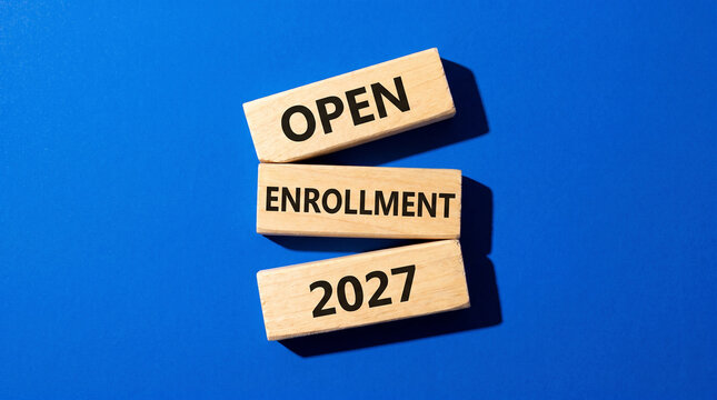 Blocks spelling open enrollment 2027 on blue background, perfect education admission banner for school and university campaigns