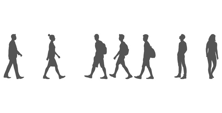 Silhouette people walking in a line with backpacks
