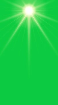 Glowing sun with soft lens flare rays pulsing on green screen, vertical video seamless loop for chroma key compositing in 4K