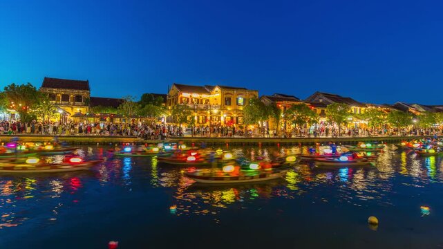 Tourists to cruise the Thu Bon River to see the atmosphere of Hoi An at night, Vietnam.