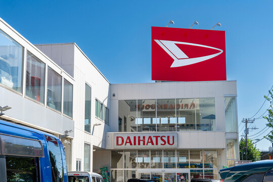 SUGINAMI-KU, TOKYO, JAPAN - SEPTEMBER 24, 2026: Exterior view of Daihatsu Tokyo Sales Ogikubo Store car dealership along Itsukaimachi-dori in Suginami-ku, Tokyo.