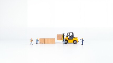 Fototapeta premium Miniature Logistics Scene Featuring Small Workers and a Yellow Forklift Truck Moving Wooden Blocks on a Clean White Background, Representing Warehouse Management and Supply Chain Operations