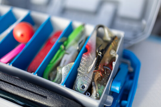 A tackle box full of colorful fishing lures