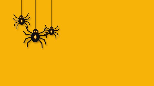Three black spiders hanging on yellow background