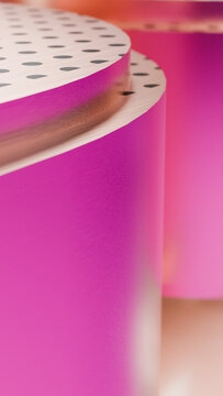 Abstract pink cylinders with polka dot tops in digital illustration