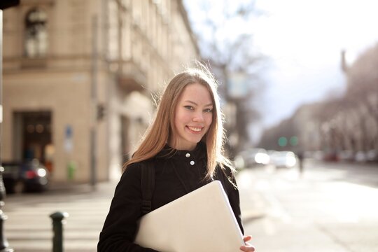 young happy woman in the city