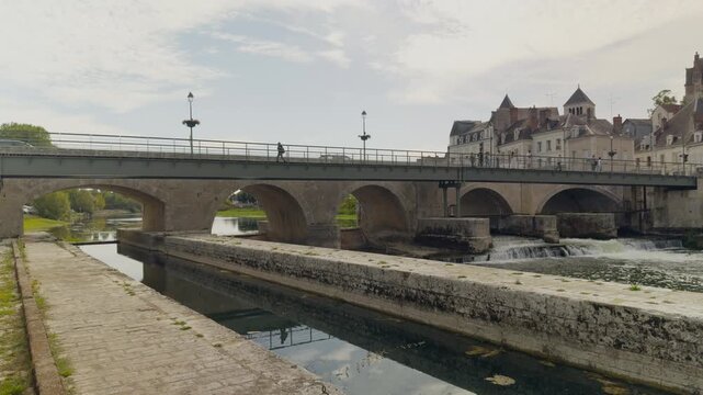 Slow motion shot of the castle, bridge and weir in Saint Aignan sur Cher France.