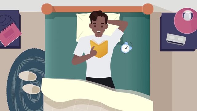 Young man lying in bed and reading an interesting yellow book inside bedroom with animated motion footage