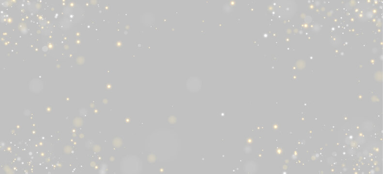 Scattered luminous particles float against a black backdrop. Golden and white dots vary in size and intensity with a soft glow effect. This image suits festive or abstract digital design.