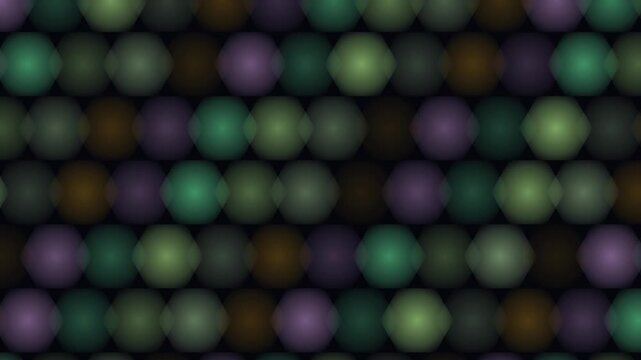 Dark repeating pattern of blurred octagons in various muted colors against a black background