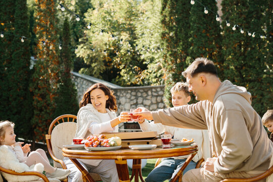 Family enjoying outdoor meal celebrating togetherness