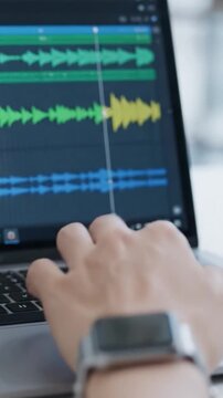 A Close-Up View of Music Editing: Engaging with Audio Waveforms on a Laptop During Sound Design and Production Sessions