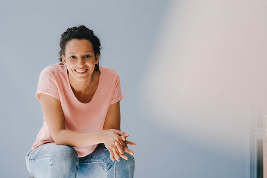 Confident woman smiling happily