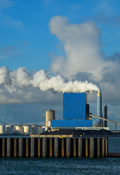 A coal fired power station emits smoke in Rotterdam harbor
