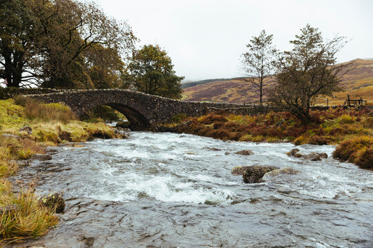 United Kingdom, England, Cumbria, Lake District, stone bridge over the river Duddon