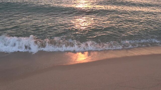 Sunrise ocean waves gently washing ashore with soothing ASMR sound.
A serene sunrise long-take video capturing gentle waves washing onto the sandy beach in Gangneung, South Korea, on July 7, 2026.