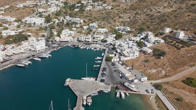 Ios Main Port with Yachts and White Houses in Greece Aerial View