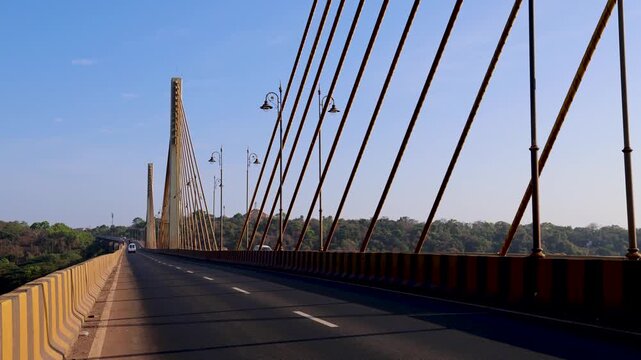 Cable Stayed Bridge Over River Landscape Under Clear Blue Sky