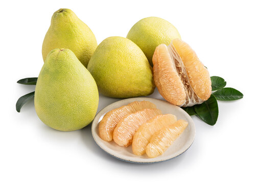 Fresh pomelo fruit with leaf isolated on white background with clipping path.