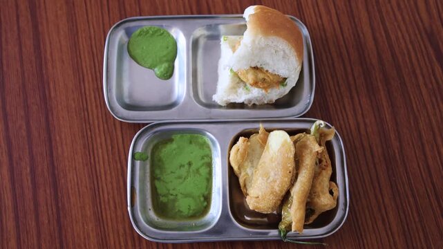 Delicious Vada Pav And Assorted Bhaji Served With Fresh Green Chutney