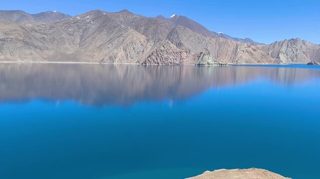 Pangong tso lake in Ladakh. Indian Himalaya mountain lake and scenic landscape with reflection in the water