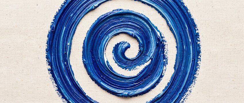 Blue acrylic paint spiral on textured fabric canvas. Hand painted swirl with visible brush strokes and impasto texture. Abstract art composition