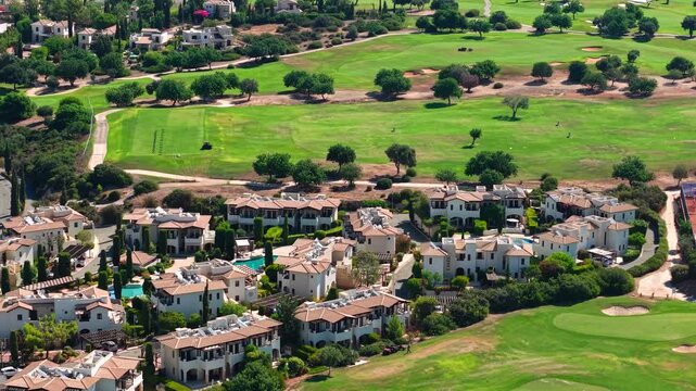 Aphrodite Hills, Cyprus. Drone View of Luxury Villa Buildings, Golf Course and Tennis Fields