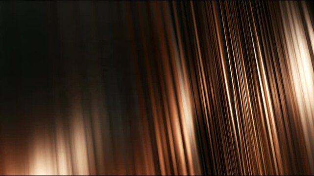 Abstract blurred copper and amber light streaks in a photographic style on a dark background, suggesting motion, warmth, and elegance