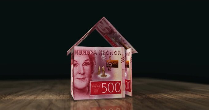 Sweden krona 500 SEK money banknotes paper house on the table. Swedish currency notes 3D concept of home mortgage loan, debt, rent, costs, liabilities and building wealth financing.