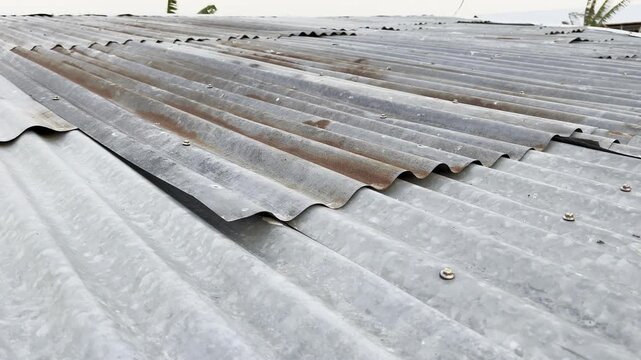 High angle view of old rusty corrugated zinc roof for background