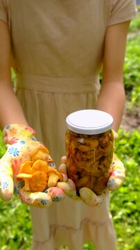 Preservation of chanterelle mushrooms in a jar. Selective focus.