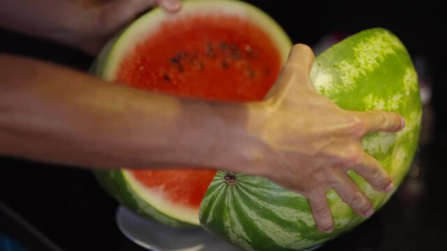 Sliced Ripe Watermelon With Red Juicy Flesh And Green Rind On Plate