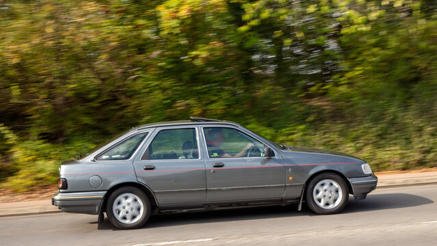 Milton Keynes; UK - Sept. 27th 2026: 1992 Ford Sierra ghia classic car driving on a British road