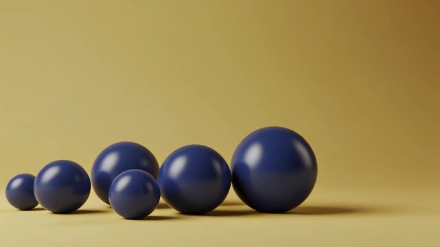 Glossy Cobalt Blue Spheres Moving Across a Mustard Yellow Background