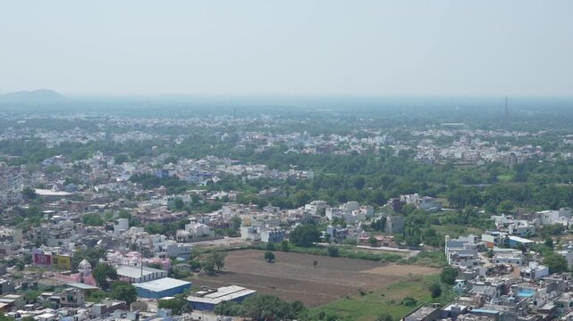 Elevated panoramic aerial view of Chittorgarh city landscape